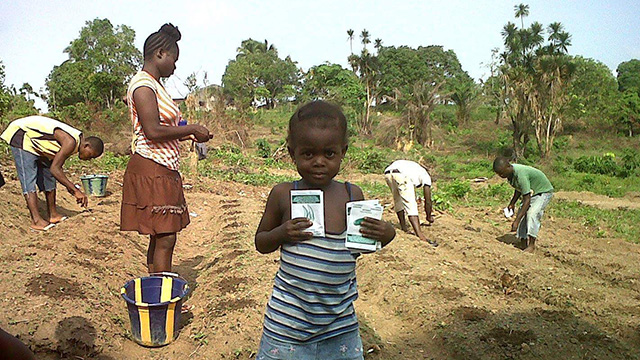 Kids planting seeds